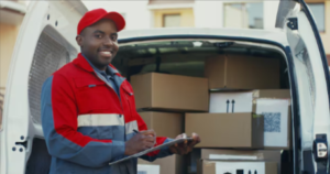 Mane Shipping delivery driver loading packages for a reliable shipping company in Arizona, services fast and efficiently